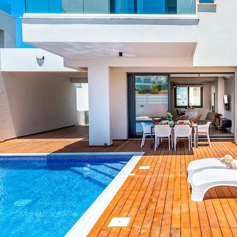 Soak up the Cypriot sun by the private pool
