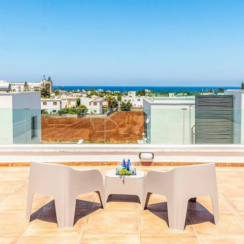 Take in the views over the Mediterranean Sea from the roof terrace
