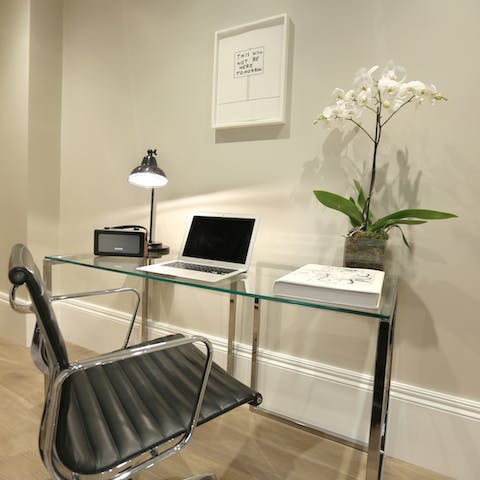 Work from home at the sleek desk area 