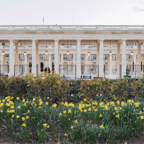 Smell the flowers in the Palais-Royal Gardens, just across the street