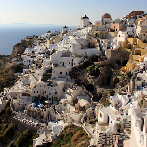 Explore the picturesque town of Oia, one-minute walk away
