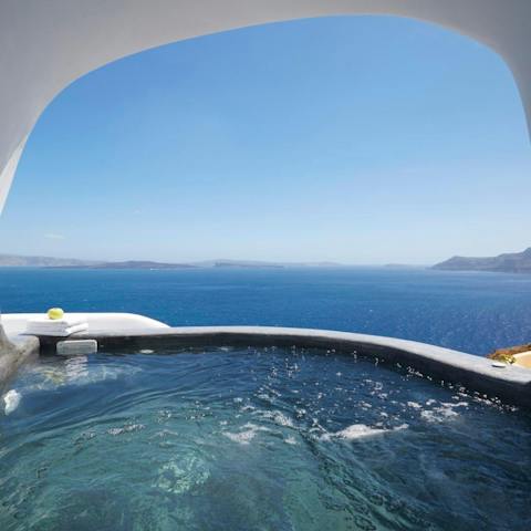 Soak up the ocean views from your heated jacuzzi