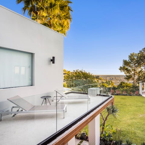 Take a quiet moment to yourself on the balcony off the master bedroom