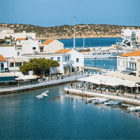 Visit the nearby town of Agios Nikolaos and sample some traditional Greek fare at a taverna