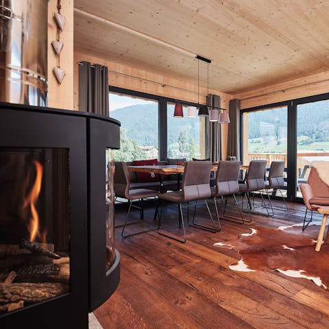 Get cosy by the fire in the living area