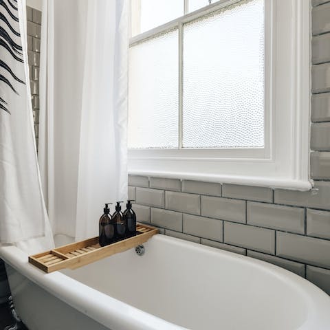 Treat yourself to a rejuvenating soak in the freestanding bathtub