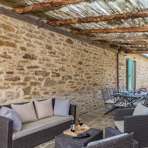 Enjoy your aperitivo under one of several covered terraces