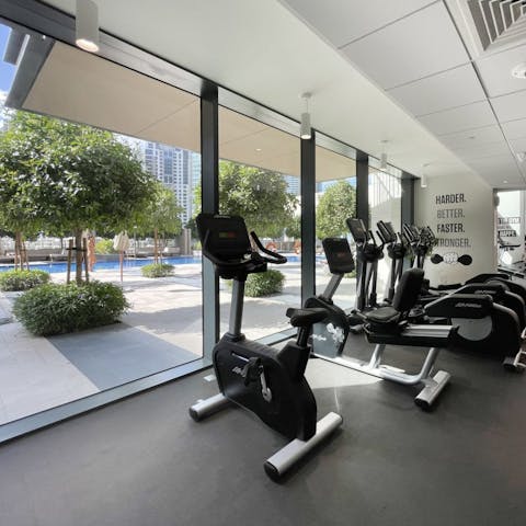 Get your sweat on in the communal gym overlooking the pool area