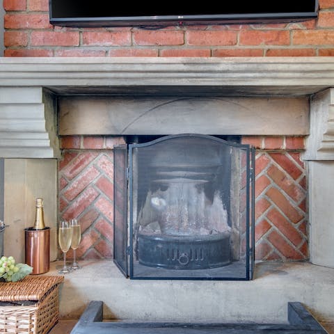 The decorative fireplace adds a pop of character