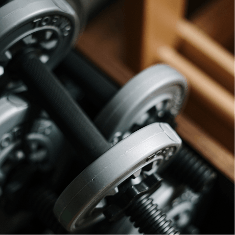 Lift weights in the building's on-site gym before setting off for the day
