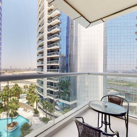 Sit down for a cup of coffee on your private balcony