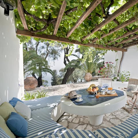 Spend evenings sharing wine and nibbles on the leafy patio