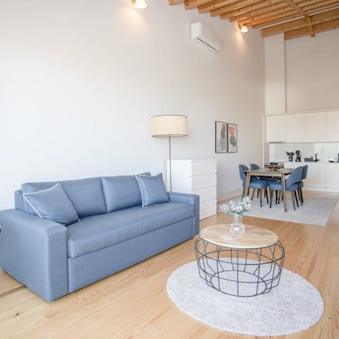 Kick back in the open-plan living area with a glass of wine after day of exploring Porto