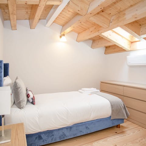 Fall asleep to the glow of the moon in the cosy mezzanine bedroom