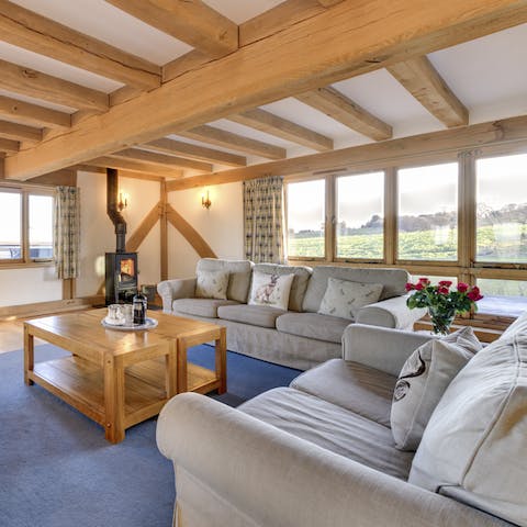 Light the fire and cosy up after a long walk through the hills in the rustic living room