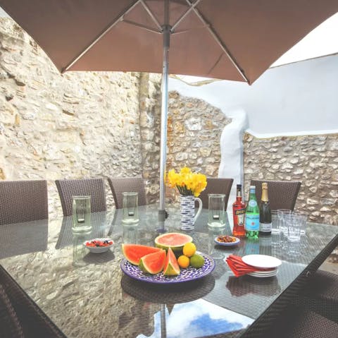 Enjoy alfresco drinks on the cosy terrace after a busy day