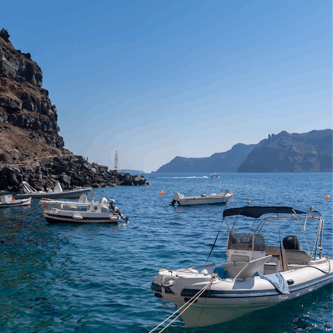 Take a boat tour from Fira's old harbour