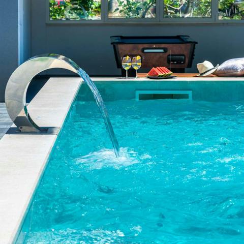 Spend long, hot afternoons dipping in and out of the refreshing pool