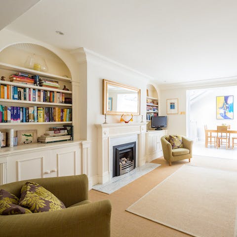 Wind down in the open plan living area with a family film or a good book