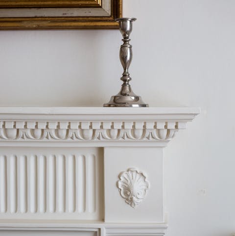 Fall in love with the pretty period features, like the fireplace and crown moulding