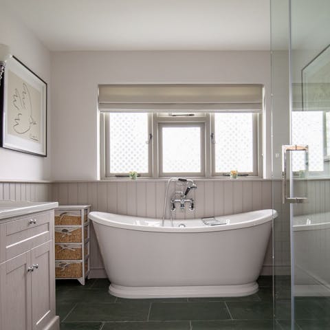 Pour yourself a glass of wine and enjoy a relaxing soak in the freestanding bath