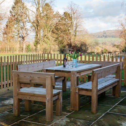Bask in the fresh country air and admire the rural scenery on the patio