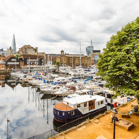 Admire all the boats at St Katherine's Dock from your private balcony