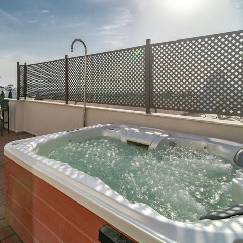 Jump into the hot tub to soothe your muscles after a day of shopping or swimming in the ocean