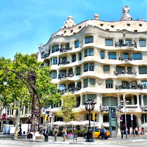 Stroll along to Gaudi's Casa Mila, just ten minutes away