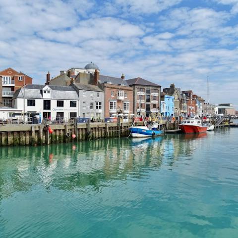 Explore the coastal town of Weymouth, a twenty-minute drive 