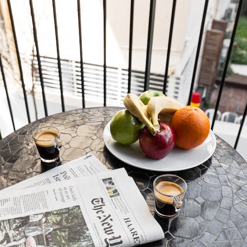 Start your day with a cup of coffee out on the balcony 