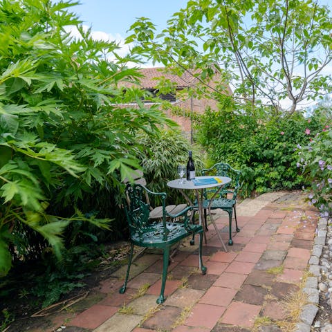 Enjoy a cup of coffee or glass of wine on the patio