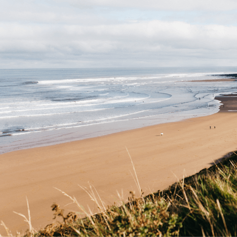 Spend an afternoon on Mundesley Beach, a ten-minute drive from your home