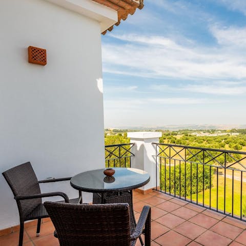 Breakfast on a secluded balcony with stunning views, just off the master bedroom
