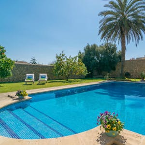 **Beautiful garden and pool** The lush garden and large pool are the perfect place to relax and enjoy the Mediterranean sun. 