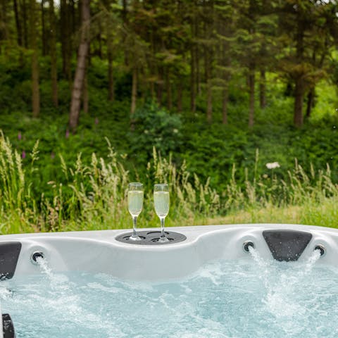 Unwind after a day of sightseeing with a long soak in the private hot tub