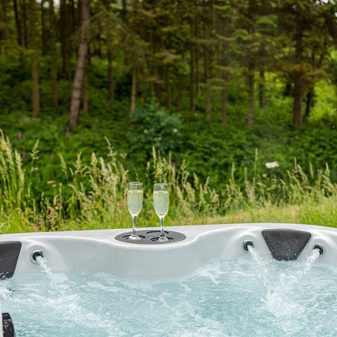 Unwind after a day of sightseeing with a long soak in the private hot tub