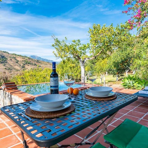 Feast on incredible vistas over an alfresco meal on the patio