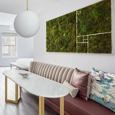 Admire the reindeer moss wall art above the dining nook
