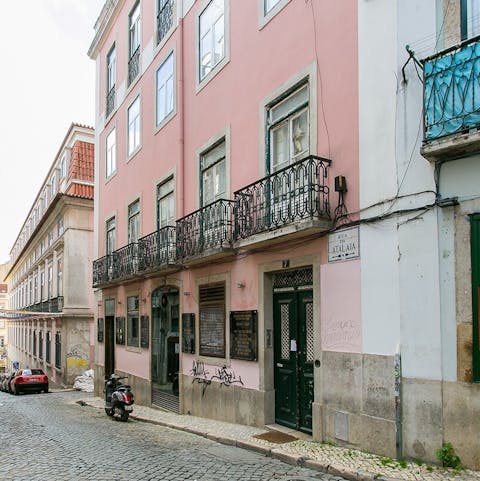 Stay tucked away on one of Lisbon's colourful streets, a five-minute walk from central Luís de Camões Square