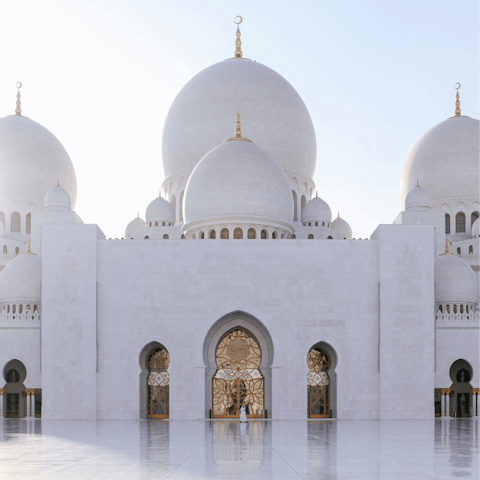 Visit the iconic Grand Mosque and admire it's eighty-two domes, a short drive away