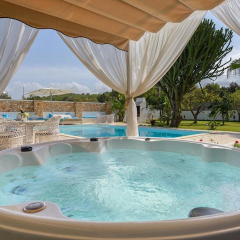 Unwind in the hot tub after a busy day exploring the island