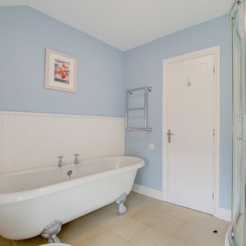 Soak tired (but happy) muscles in your beautiful freestanding tub at the end of the day