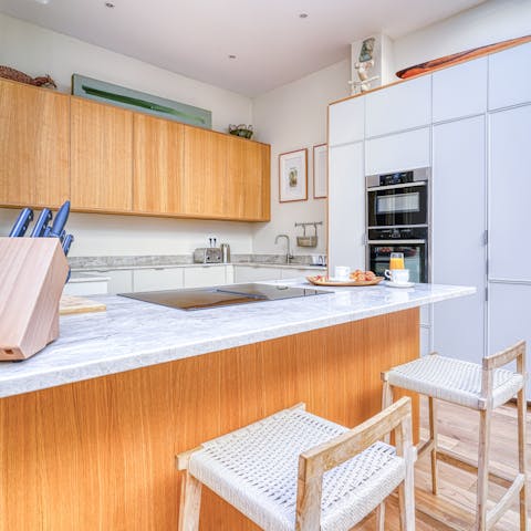 Whip up family feasts in the sleek and sociable kitchen