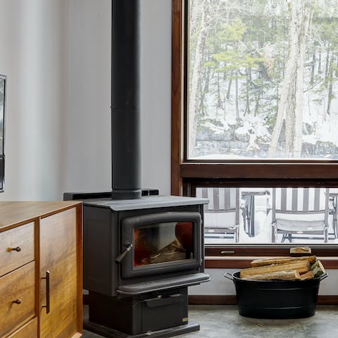 Get cosy and comfortable in front of the wood-burning stove