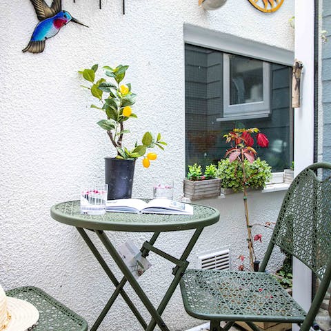 Catch golden hour with a cocktail from the home's small terrace