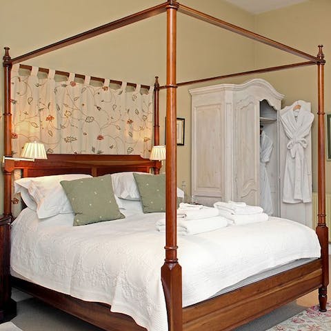 Sleep soundly in the luxurious four poster bed