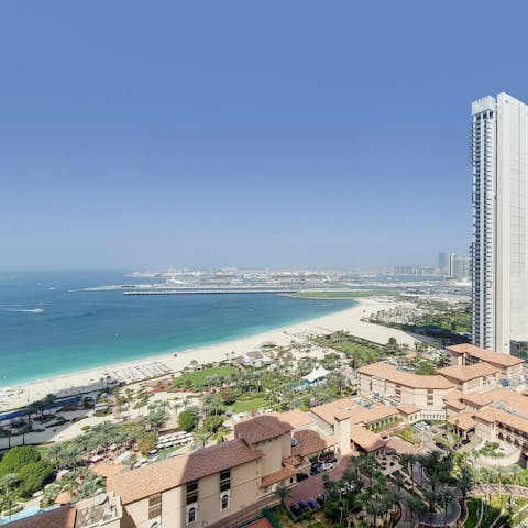 Head to the pristine white sand of Marina Beach, a ten-minute walk away