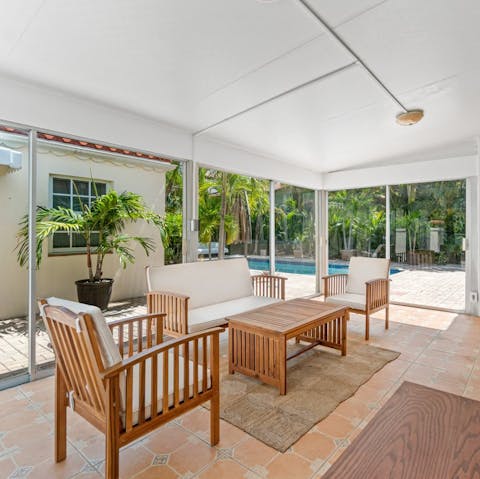 Enjoy wine and nibbles in the enclosed porch