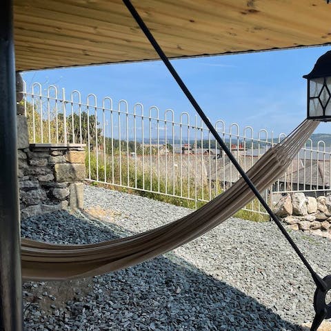 Curl up with a book in the hammock with a serene view of the bay